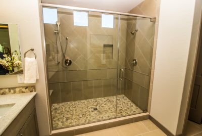 Shower featuring Stone Accents
